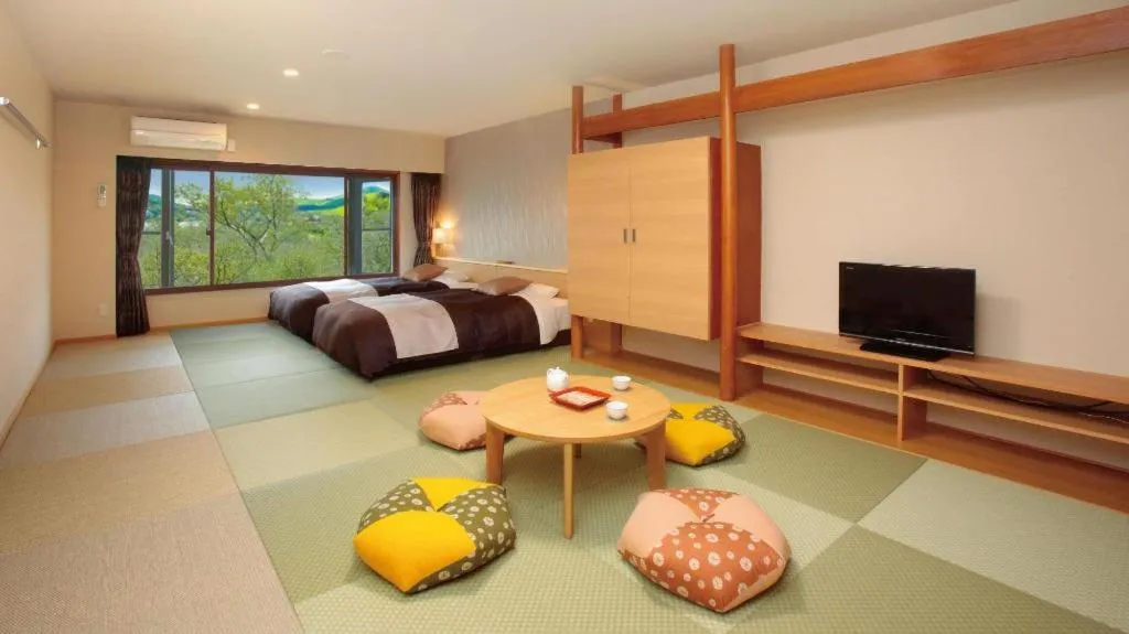 Bed in Ikenotaira Hotel