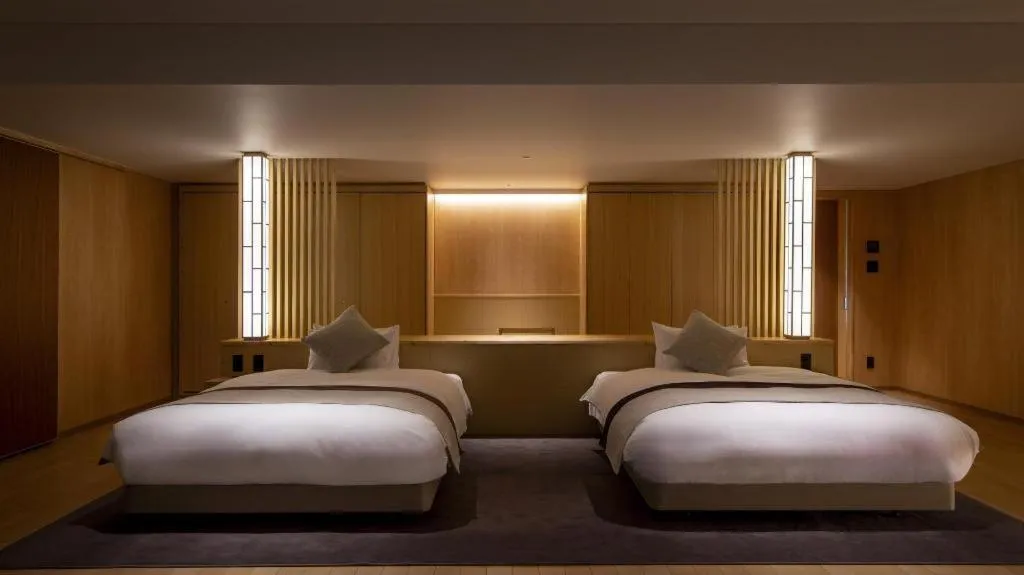 Bed in Ikenotaira Hotel