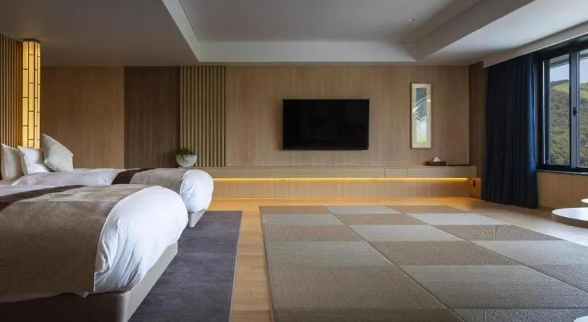 Bed in Ikenotaira Hotel