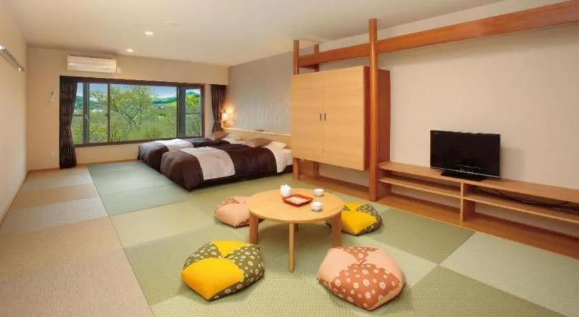 Bed in Ikenotaira Hotel