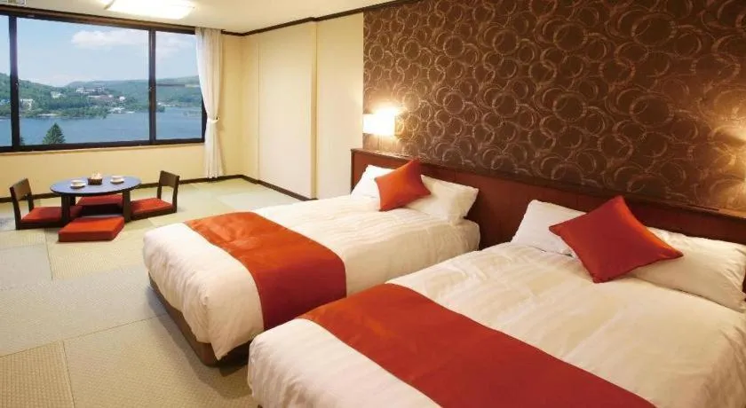 Bed in Ikenotaira Hotel