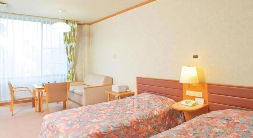 Bed in Ikenotaira Hotel