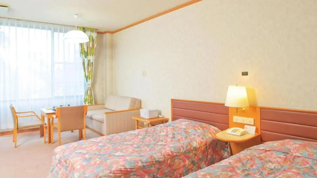 Bed in Ikenotaira Hotel