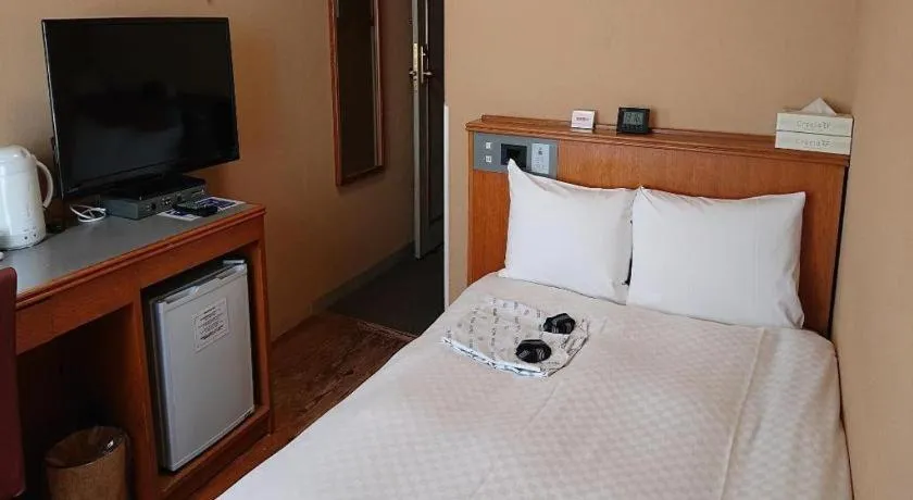 Bed in Pearl Hotel Ota