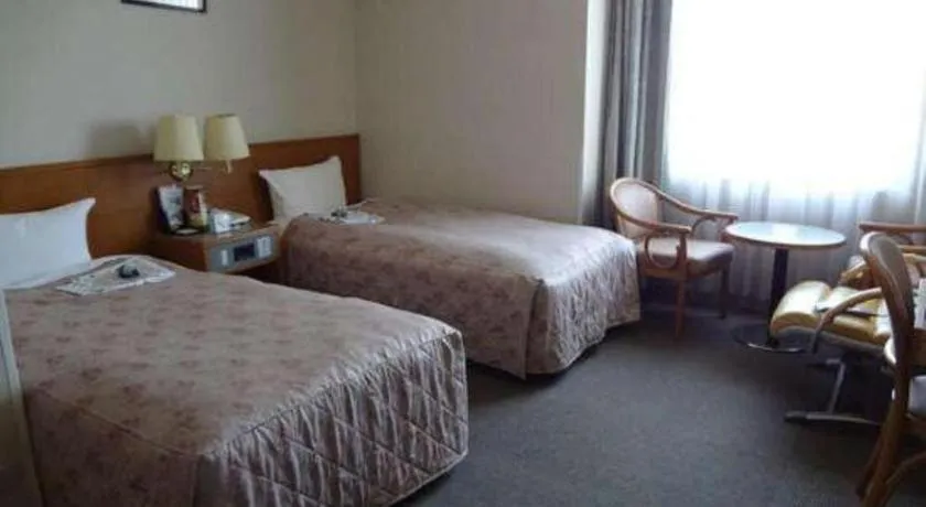 Bed in Pearl Hotel Ota