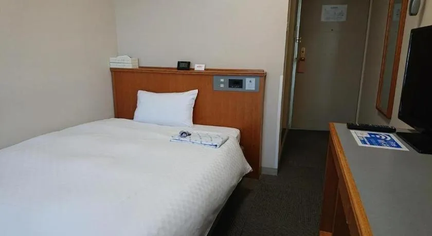 Bed in Pearl Hotel Ota