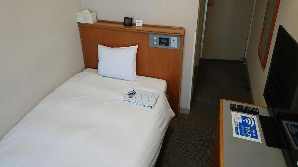 Bed in Pearl Hotel Ota