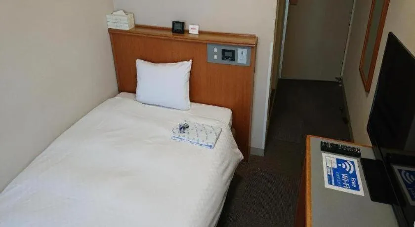 Bed in Pearl Hotel Ota