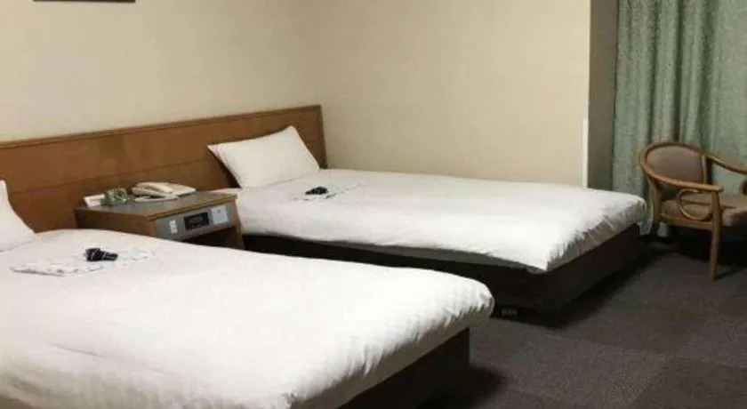 Bed in Pearl Hotel Ota