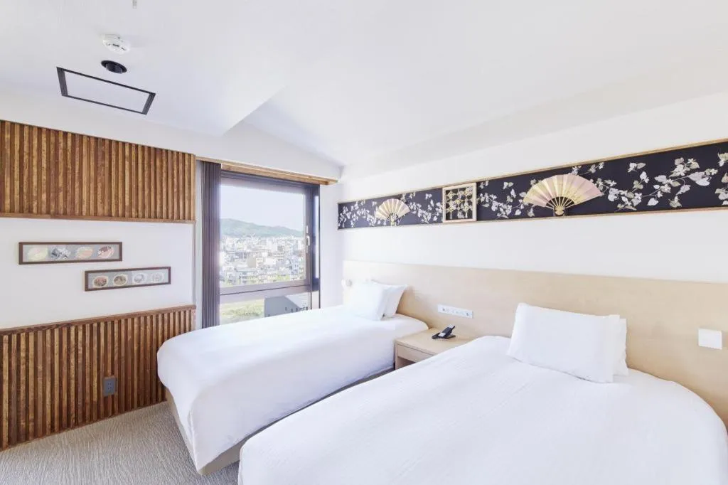 Bed in Hotel Sunroute Kyoto
