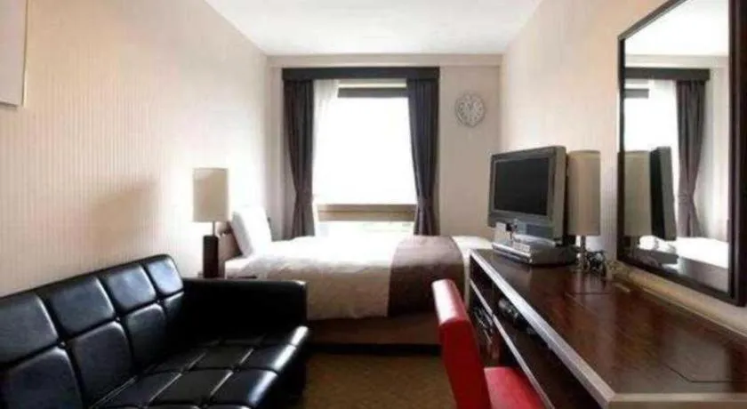 Bed in Hotel Sunroute Kyoto