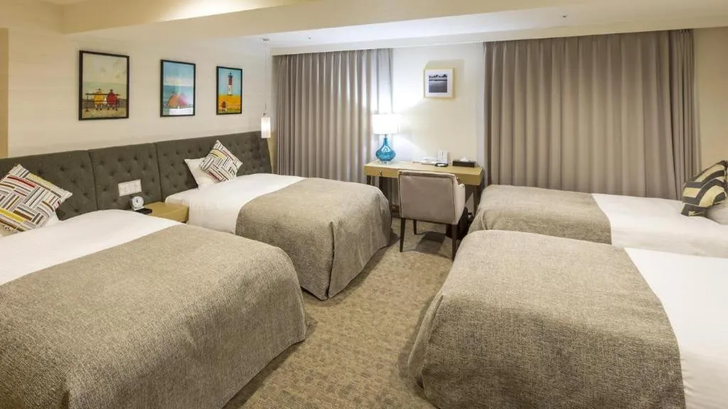 Bed in Miyazaki Kanko Hotel