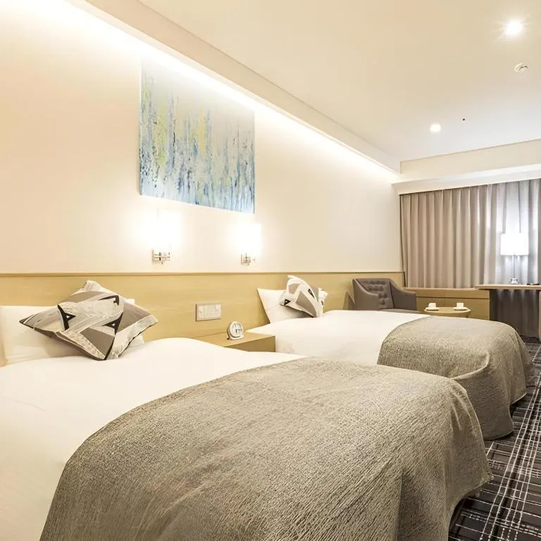 Bed in Miyazaki Kanko Hotel