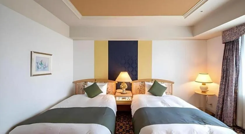 Bed in Miyazaki Kanko Hotel