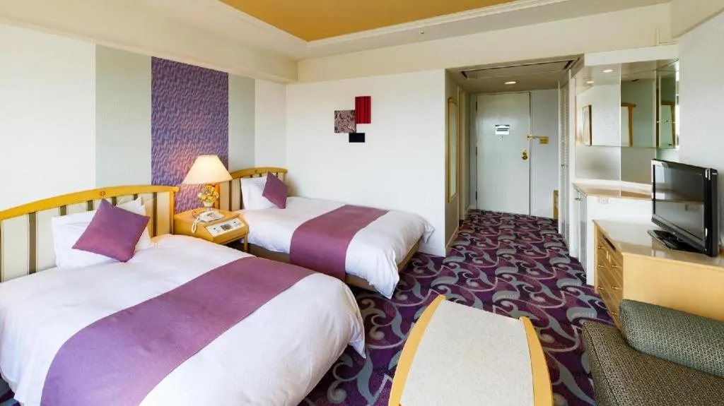 Bed in Miyazaki Kanko Hotel