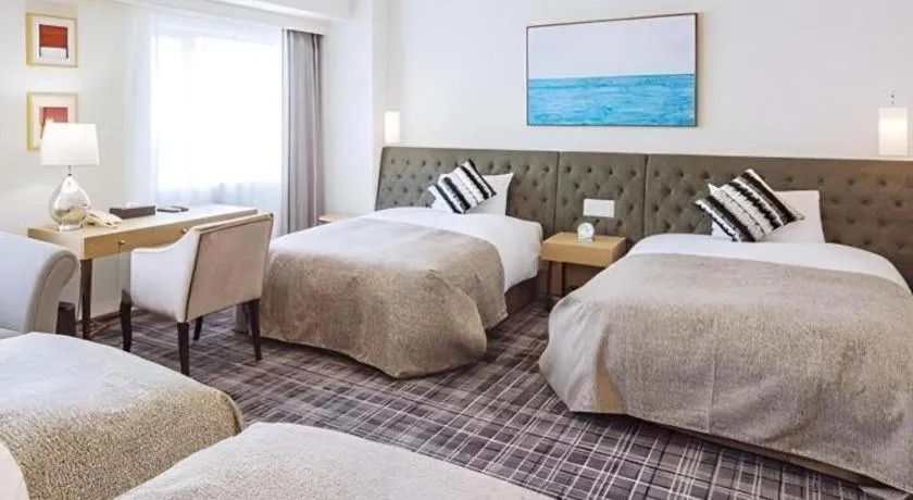 Bed in Miyazaki Kanko Hotel