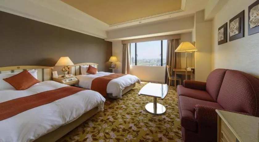 Bed in Miyazaki Kanko Hotel