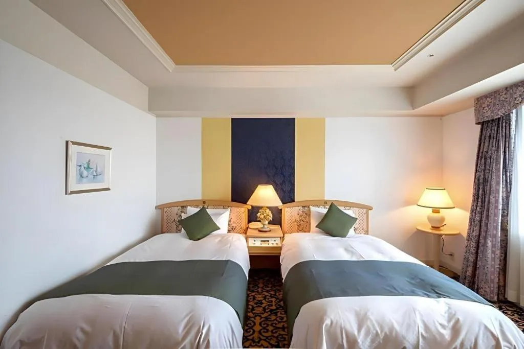 Bed in Miyazaki Kanko Hotel