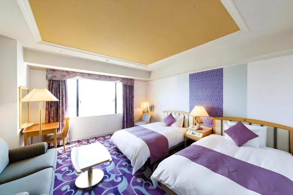 Bed in Miyazaki Kanko Hotel