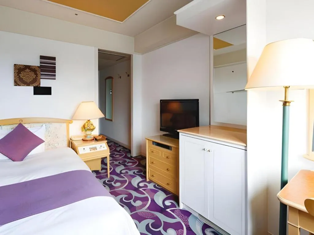 Bed in Miyazaki Kanko Hotel