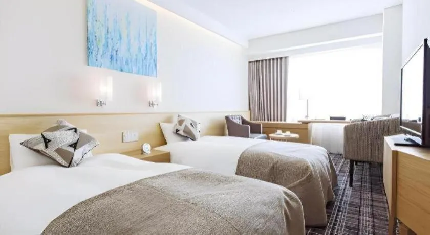 Bed in Miyazaki Kanko Hotel