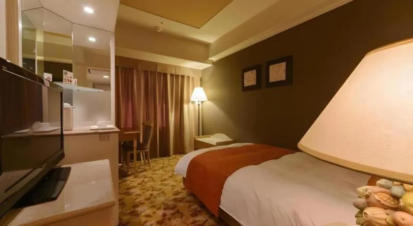 Bed in Miyazaki Kanko Hotel