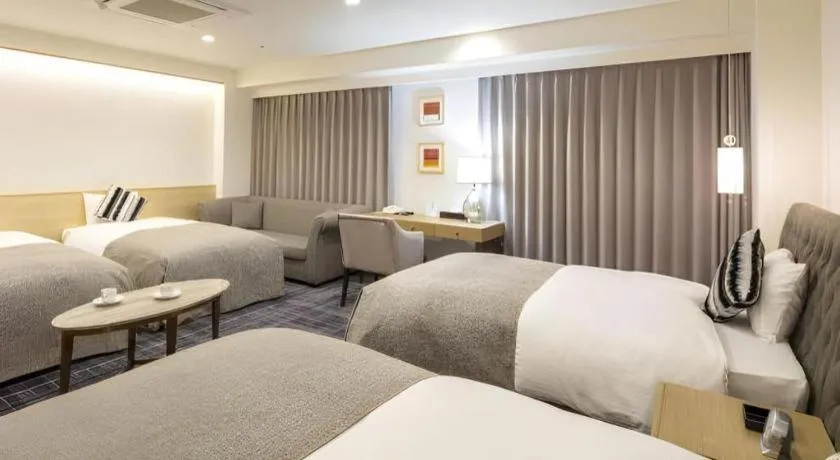 Bed in Miyazaki Kanko Hotel