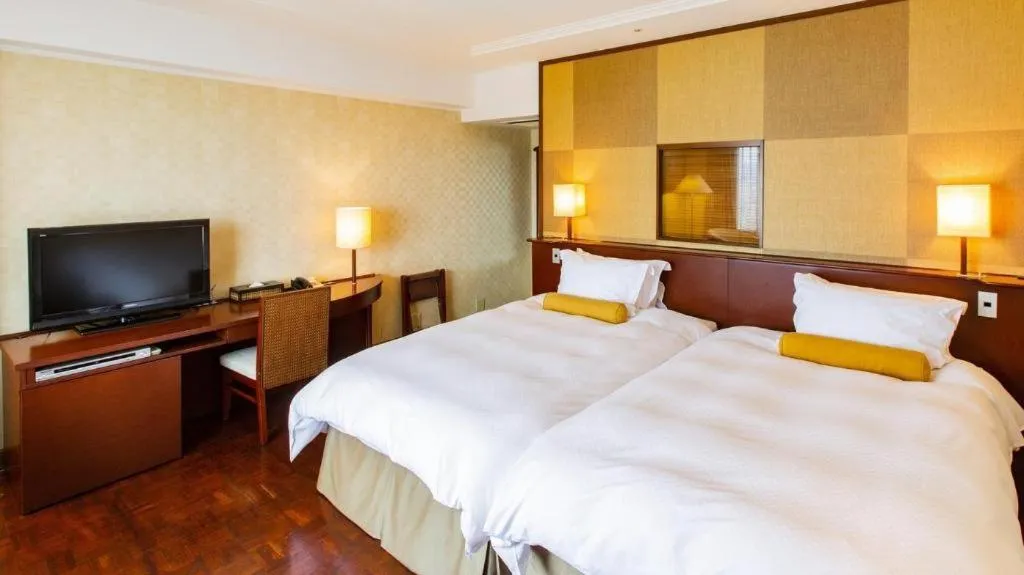 Bed in Miyazaki Kanko Hotel