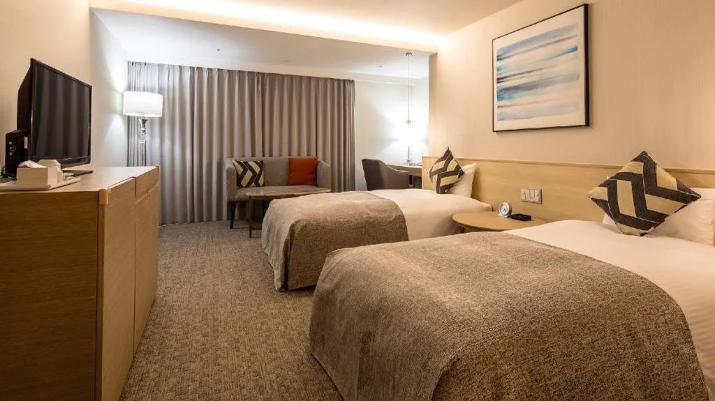 Bed in Miyazaki Kanko Hotel