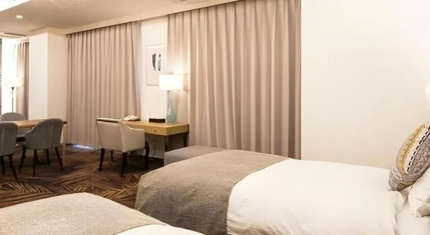 Bed in Miyazaki Kanko Hotel