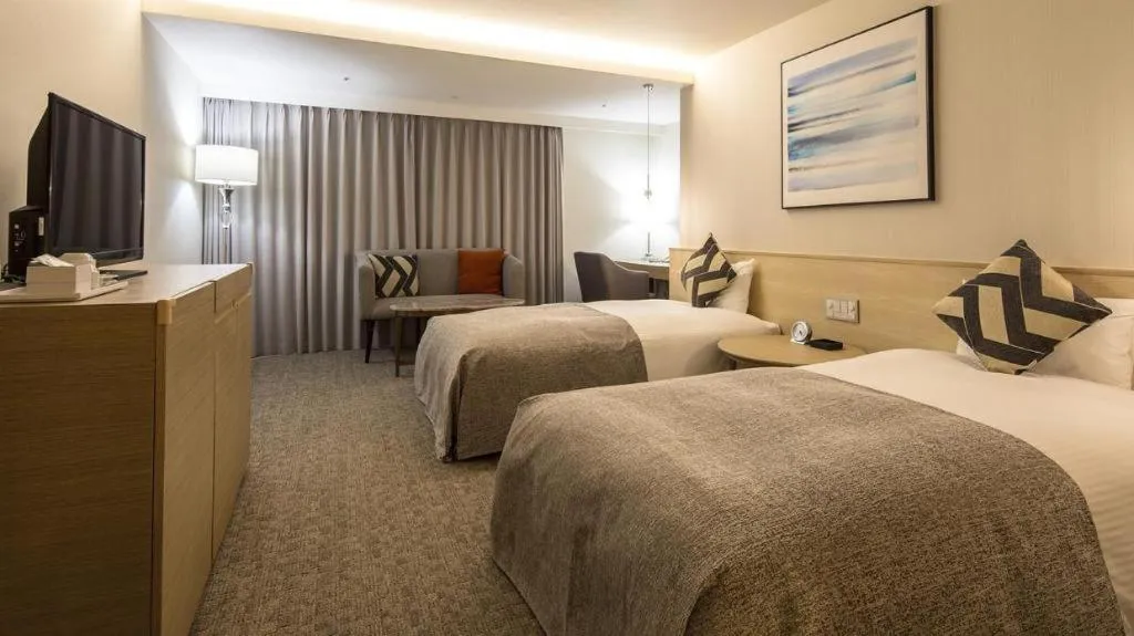 Bed in Miyazaki Kanko Hotel