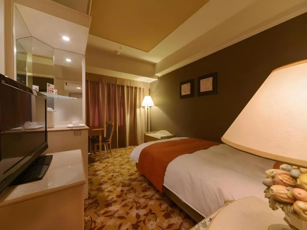 Bed in Miyazaki Kanko Hotel