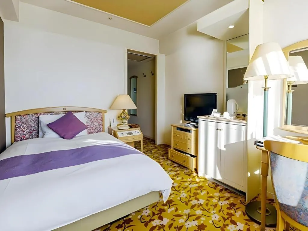 Bed in Miyazaki Kanko Hotel