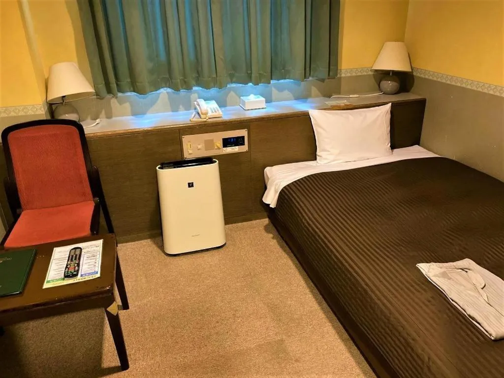 Bed in The Hamilton Sapporo Hotel