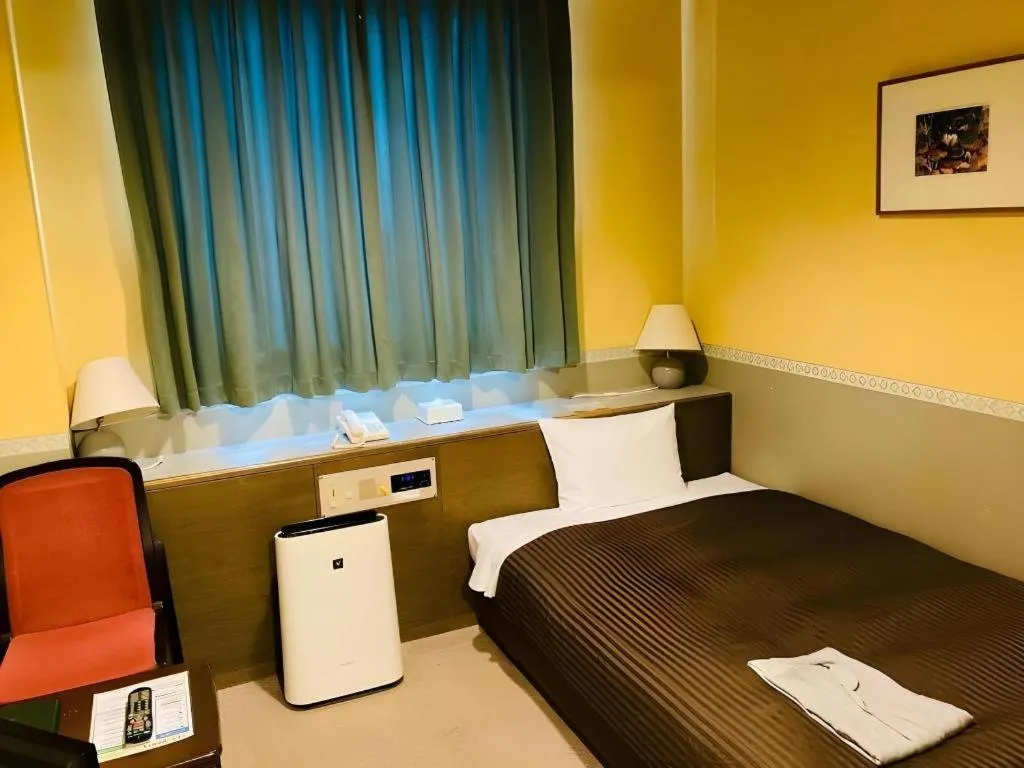 Bed in The Hamilton Sapporo Hotel