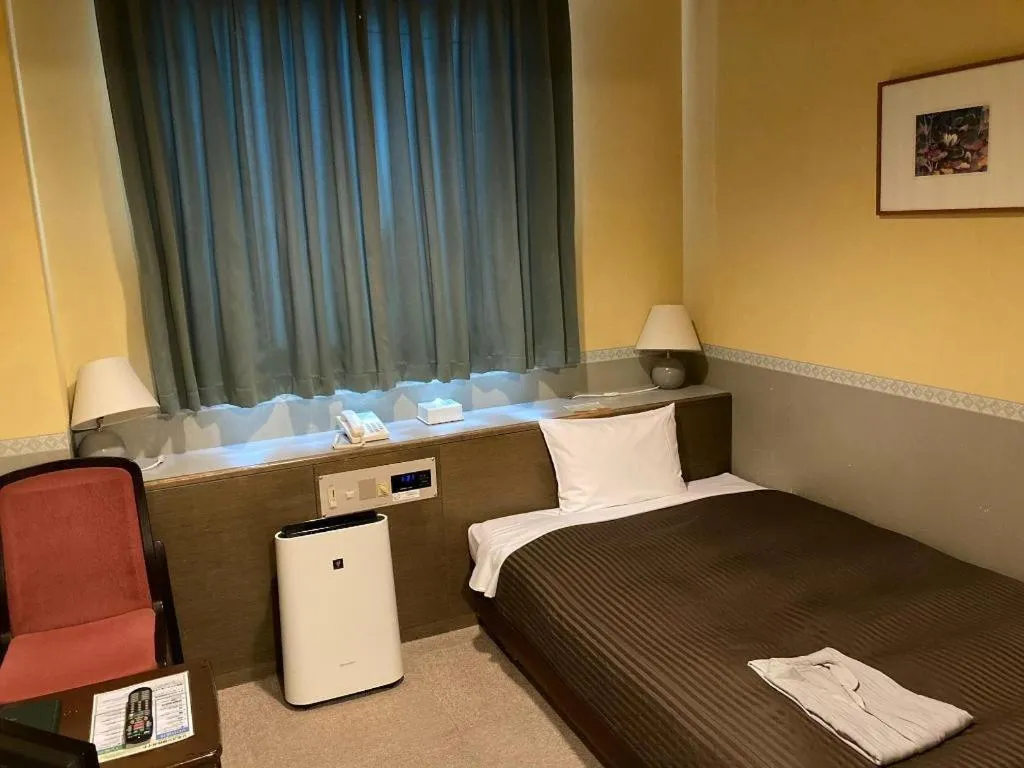 Bed in The Hamilton Sapporo Hotel