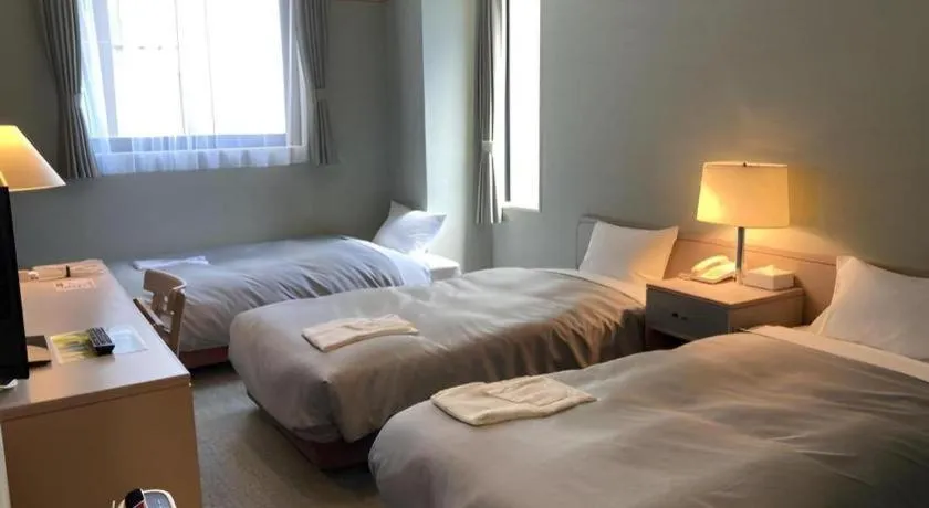 Bed in The Hamilton Sapporo Hotel