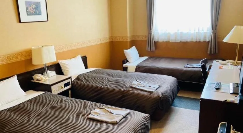 Bed in The Hamilton Sapporo Hotel