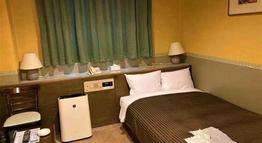 Bed in The Hamilton Sapporo Hotel