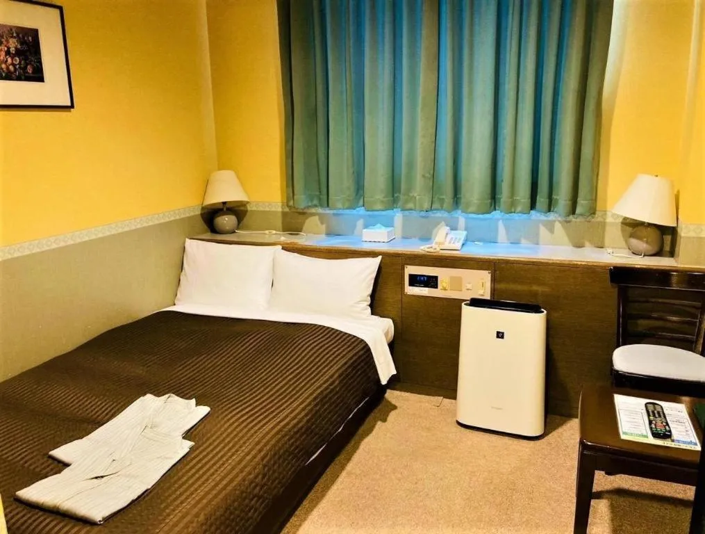 Bed in The Hamilton Sapporo Hotel