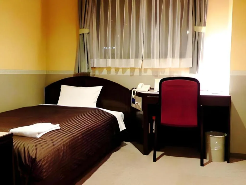 Bed in The Hamilton Sapporo Hotel