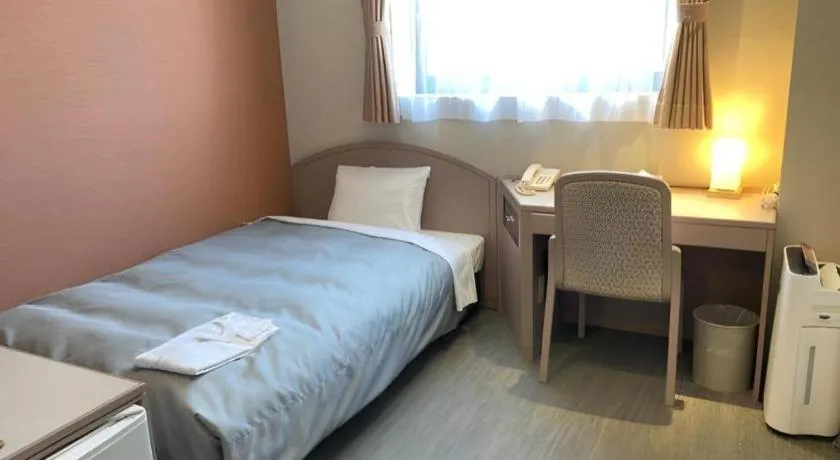 Bed in The Hamilton Sapporo Hotel