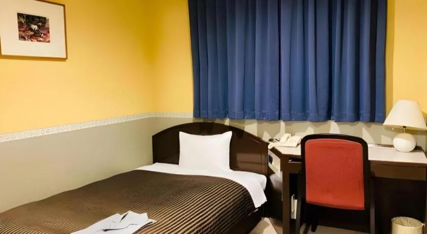 Bed in The Hamilton Sapporo Hotel