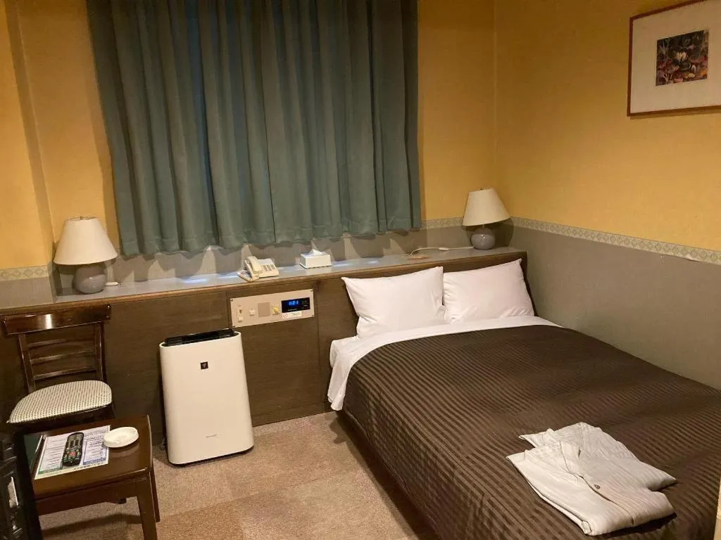 Bed in The Hamilton Sapporo Hotel