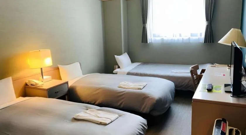 Bed in The Hamilton Sapporo Hotel