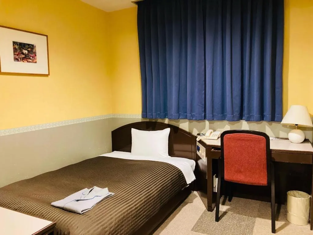 Bed in The Hamilton Sapporo Hotel