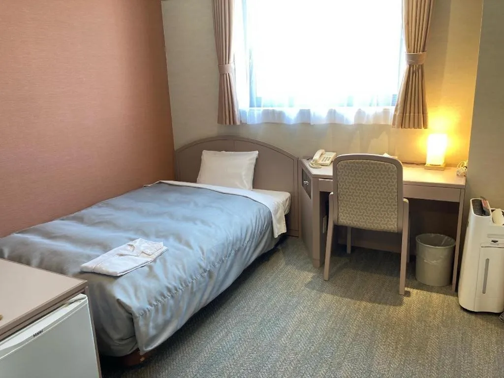 Bed in The Hamilton Sapporo Hotel