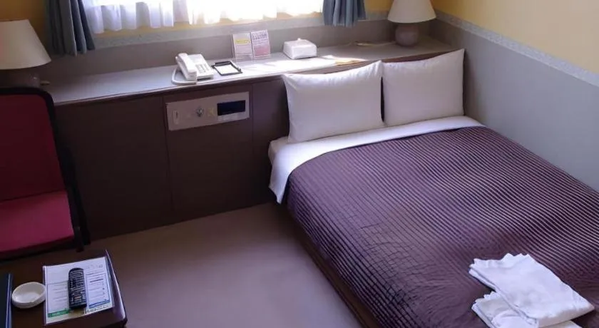 Bed in The Hamilton Sapporo Hotel