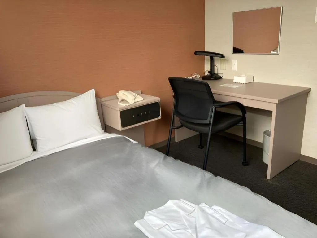 Bed in The Hamilton Sapporo Hotel