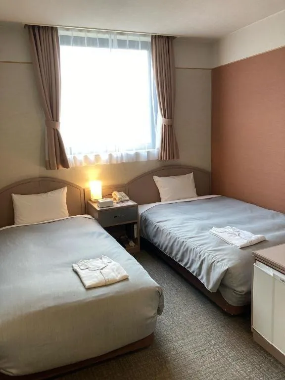 Bed in The Hamilton Sapporo Hotel